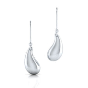 Pair of silver teardrop earrings on a white background